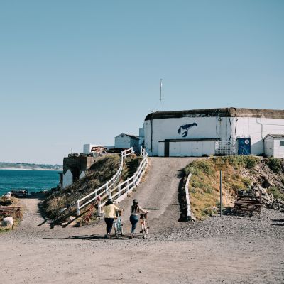 Cyclists at Faulkner Fisheries, a seafood barbecue in Jersey