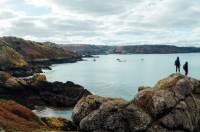 Walkers on north coast of Jersey