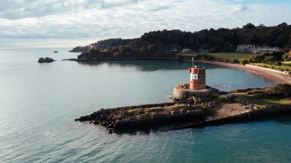 Archirondel tower with beach in background