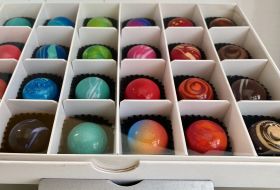 box of 24 artisanal beautiful colourful shiny chocolates