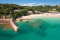 Aerial view of the pier in St. Brelade's Bay on a summer's day