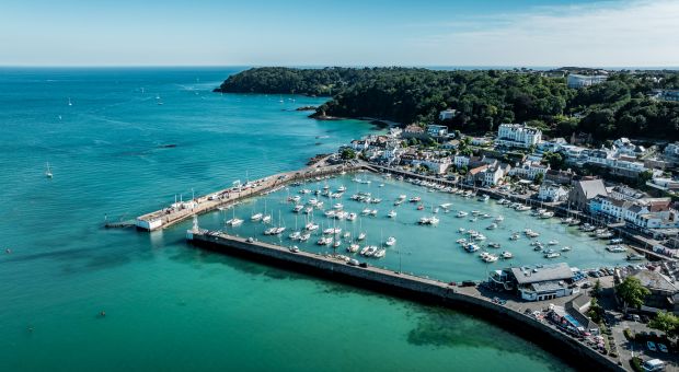 Aerial view of the blue sea and coastline of St. Aubin