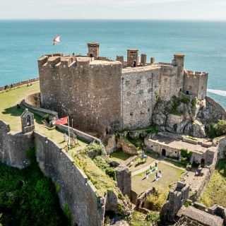 Aerial shot of a historic castle, Mont Orgueil, in Jersey
