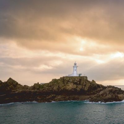 Moody shot of La Corbiere Lighthouse in Jersey, Channel Islands