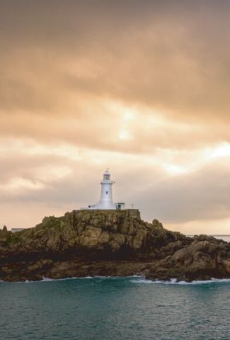 Moody shot of La Corbiere Lighthouse in Jersey, Channel Islands