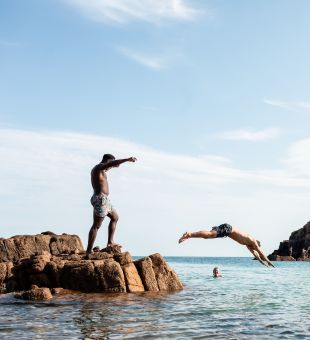 People diving into the sea at Portelet