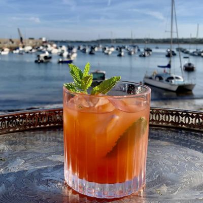 Cocktail with sea in the background